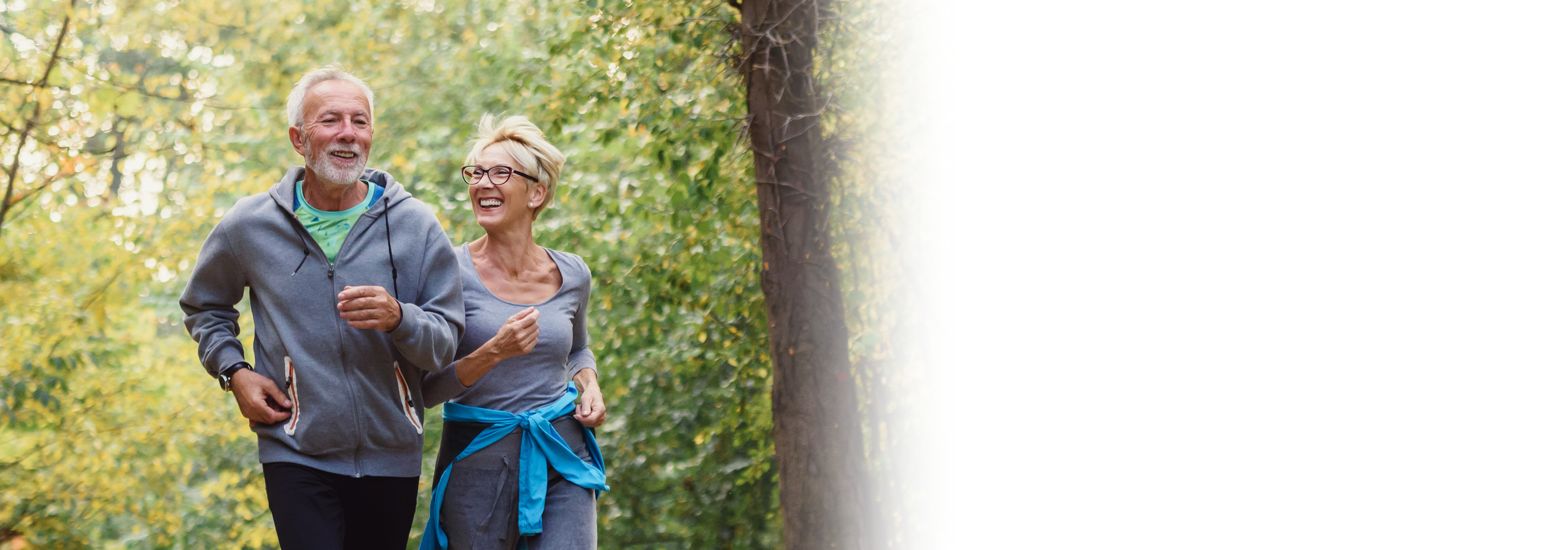 Couple jogging on path - CCM Health Orthropedics